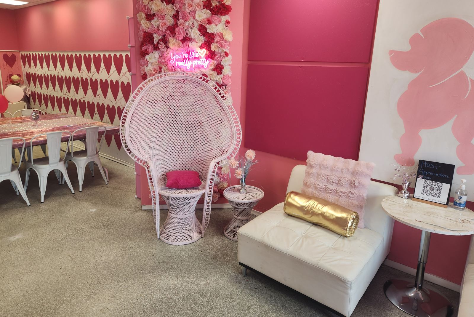 Flower wall backdrop for gender reveal venue rental Omaha