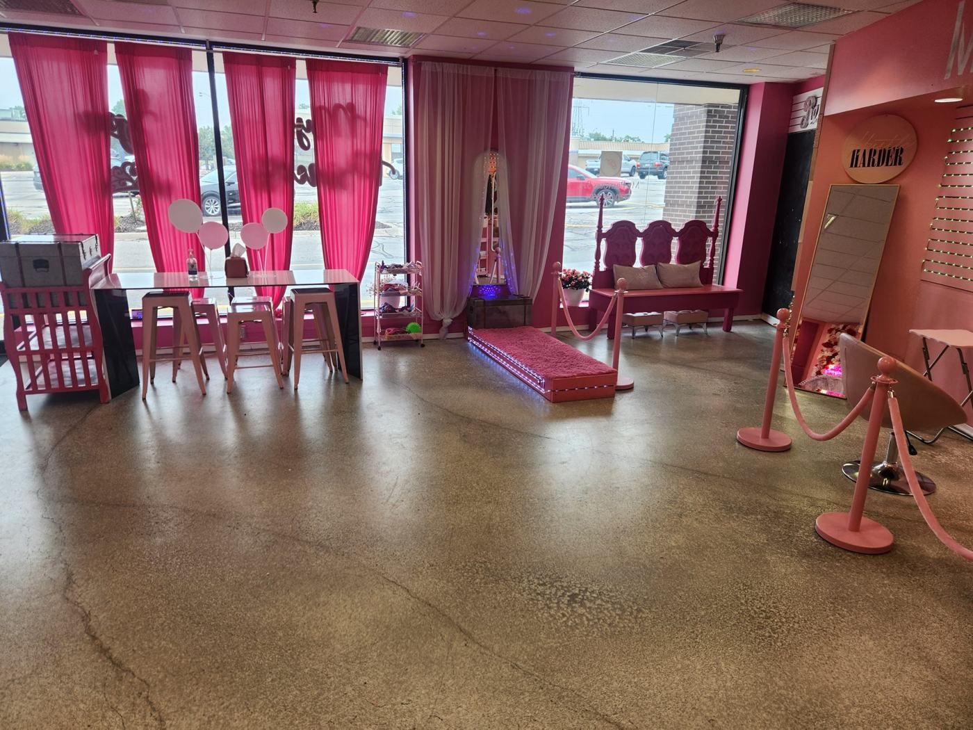 Pink curtained window lounge area at My Princess Spa Omaha